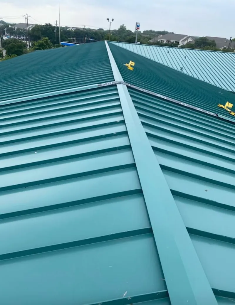 Green commercial metal roof ridge and valley for Metal Roof Repair in Santa Barbara