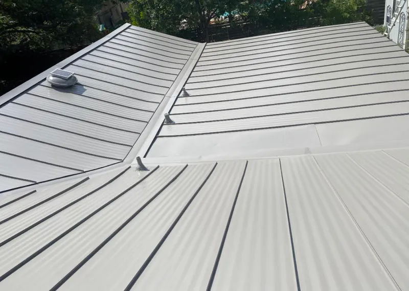 Solar attic fan installed on a metal roof for Roof Ventilation in Santa Barbara